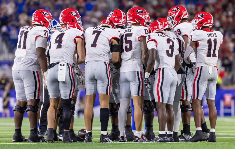 LEXINGTON, KENTUCKY – SEPTEMBER 14: Members of the Georgia Bulldogs meet during the game against the Kentucky Wildcats at Kroger Field on September 14, 2024 in Lexington, Kentucky. (Photo by Michael Hickey/Getty Images)