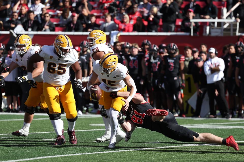 Nov 4, 2023; Salt Lake City, Utah, USA; Arizona State Sun Devils quarterback Jacob Conover (15) is sacked by Utah Utes defensive end Connor O'Toole (81) in the second quarter at Rice-Eccles Stadium. Mandatory Credit: Rob Gray-USA TODAY Sports