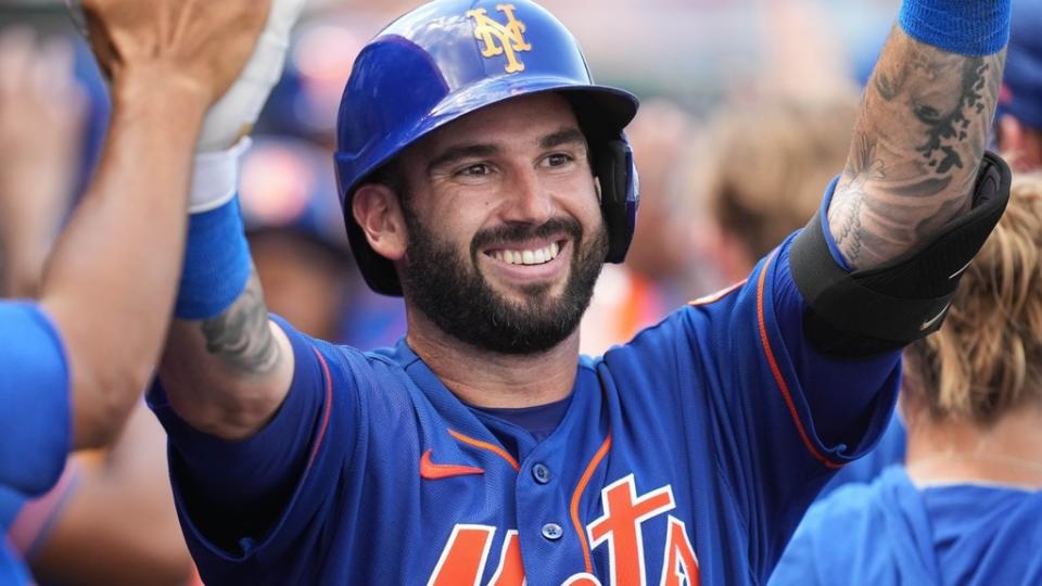 Mar 13, 2023; Jupiter, Florida, USA; New York Mets catcher Tomas Nido (3) celebrates a three-run home run with teammates in the fifth inning against the Miami Marlins at Roger Dean Stadium.