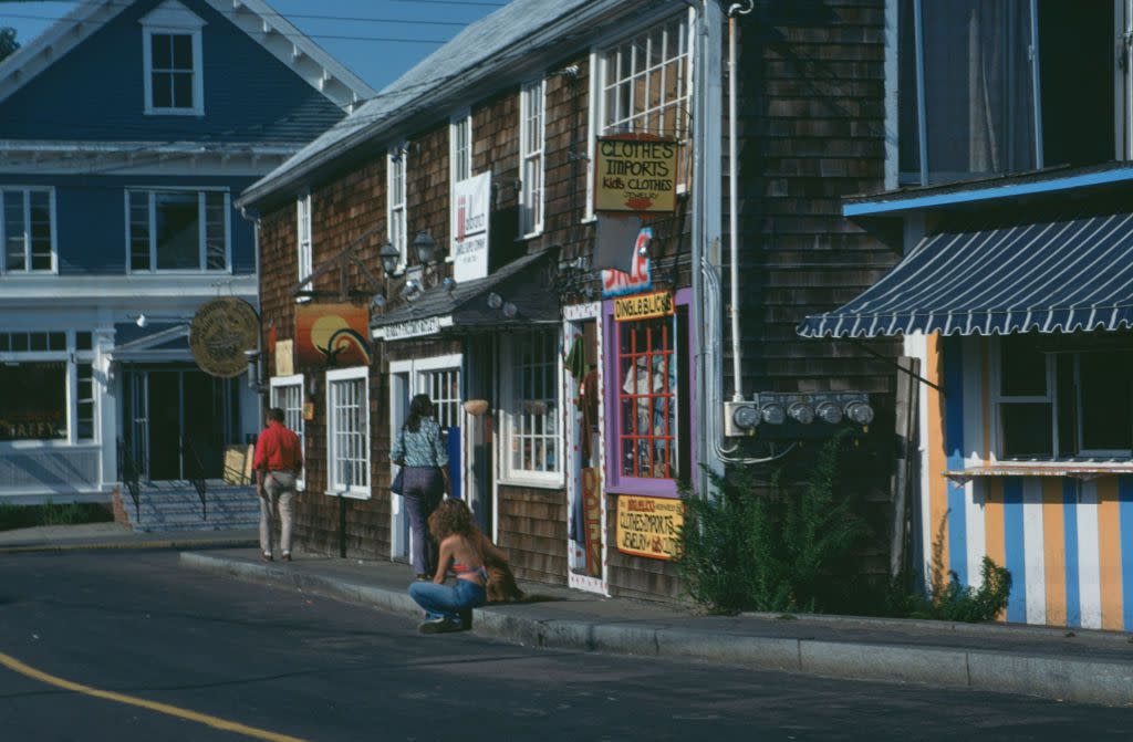 ourist shops on a street in Provincetown, Cape Cod, Massachusetts, circa 1975.