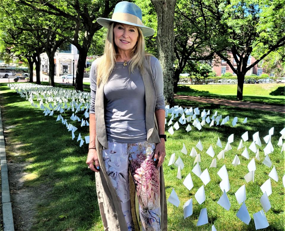 Artist Suzanne Firstenberg, designer of the COVID memorial flag display.