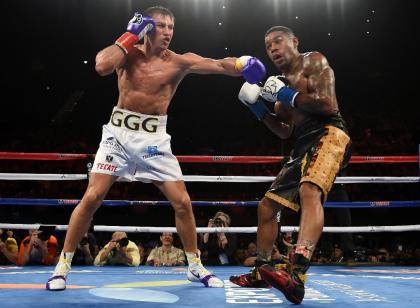 Gennady Golovkin (L) lands a left hook on Willie Monroe during their May 16 fight. (AFP)