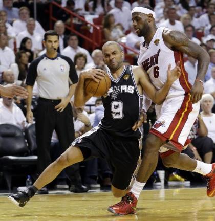 Tony Parker and the Spurs ran circles around Miami en route to a record performance. (AP) 