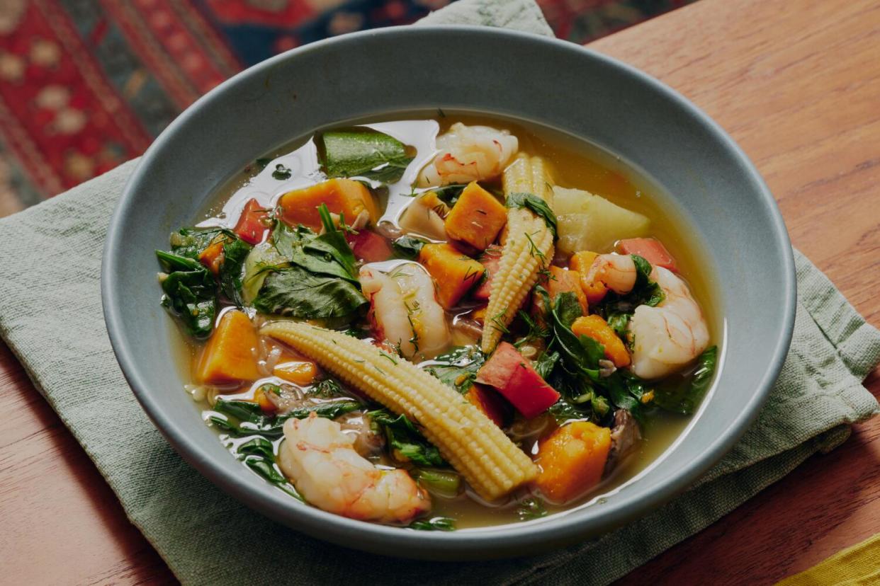 Dishes and cooking of soup in Michelle Huneven's kitchen.