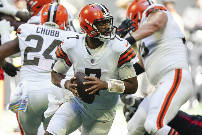 Cleveland Browns quarterback Jacoby Brissett (7) moves oput of the pocket against the Atlanta Falcons during the first half of an NFL football game, Sunday, Oct. 2, 2022, in Atlanta. (AP Photo/John Bazemore)