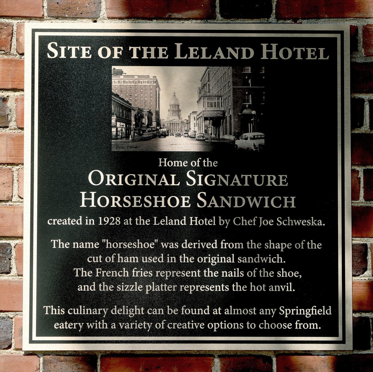 A plaque commemorating the Horseshoe sandwich was unveiled on the Leland building on Thursday, June 20, 2024, in Springfield.