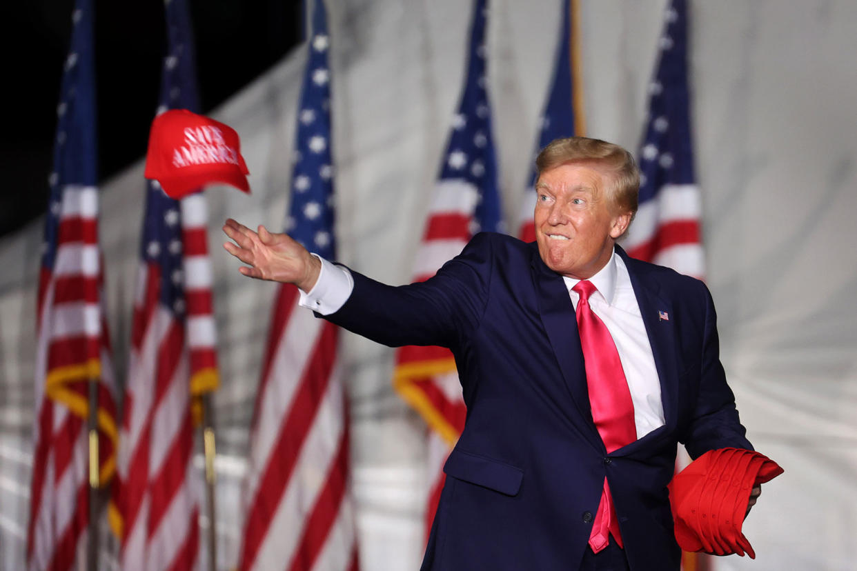 Donald Trump throwing hat Scott Olson/Getty Images