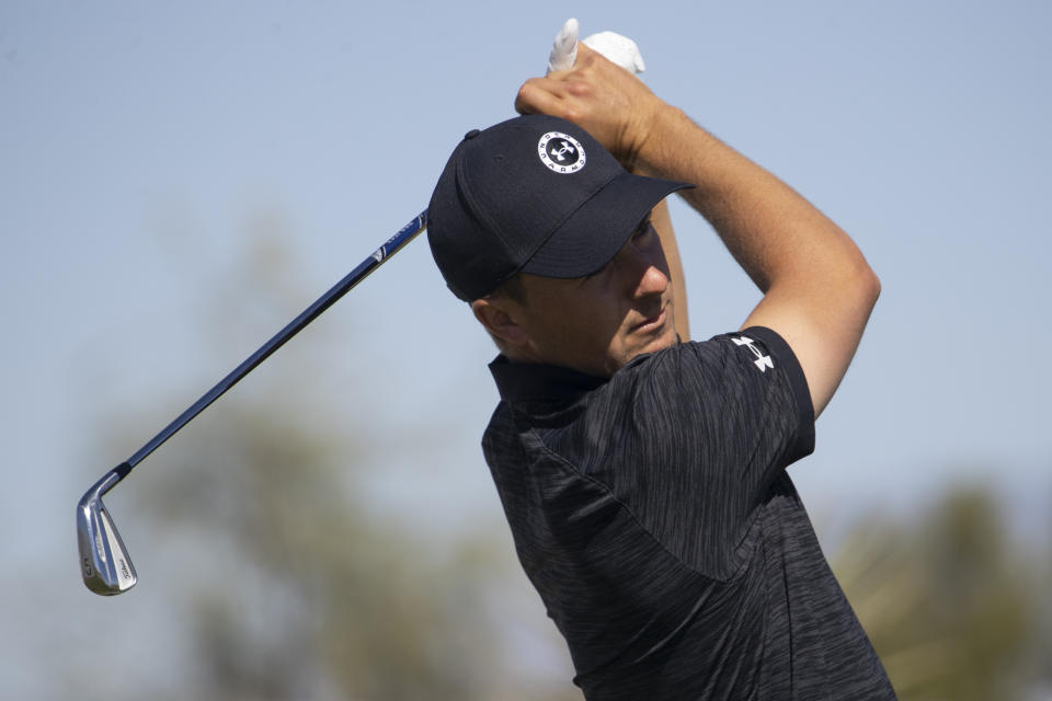 Jordan Spieth hits from the first tee during the third round of the CJ Cup golf tournament at Summit Club in Las Vegas, Saturday, Oct. 16, 2021. (Erik Verduzco/Las Vegas Review-Journal via AP)