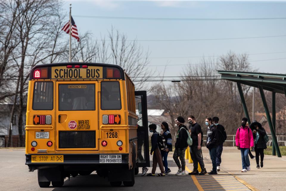 Students board JCPS school buses at Western High School on Wednesday afternoon. March 16, 2022