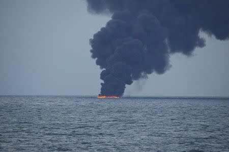 Flames and smoke from the Iranian oil tanker Sanchi is seen in the East China Sea, on January 15, 2018 in this photo provided by Japan's 10th Regional Coast Guard. 10th Regional Coast Guard Headquarters/Handout via REUTERS