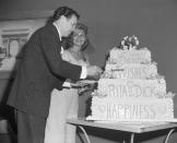 <p>The Sands Hotel made the stars this four-tiered cake with a sweet message: "The Sands wishes Rita and Dick happiness." The couple divorced two years later.</p>