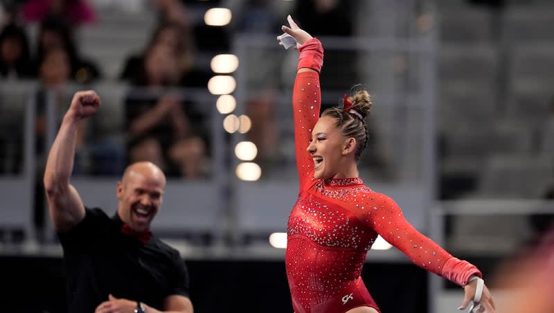 Utah's Makenna Smith celebrates after her uneven-bars routine during the NCAA women's gymnastics championships in Fort Worth, Texas, Thursday, April 18, 2024.