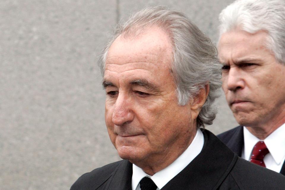 In this March 10, 2009, file photo, former financier Bernie Madoff leaves federal court in Manhattan, in New York. Madoff, the financier who pleaded guilty to orchestrating the largest Ponzi scheme in history, has died in prison, a person familiar with the matter tells The Associated Press.