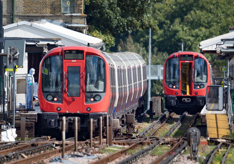 <em>Forensics examine a District Line train following the explosion in Parsons Green (Rex)</em>