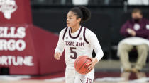 Texas A&M guard Jordan Nixon (5) brings the ball down court against Lamar during the second half of an NCAA college basketball game Wednesday, Nov. 25, 2020, in College Station, Texas. (AP Photo/Sam Craft)