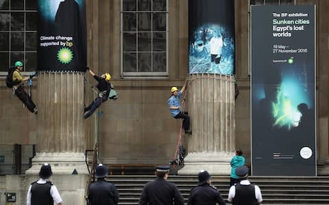 Greenpeace activists protest outside the British Museum in 2016  - Credit: Dan Kitwood/Getty Images