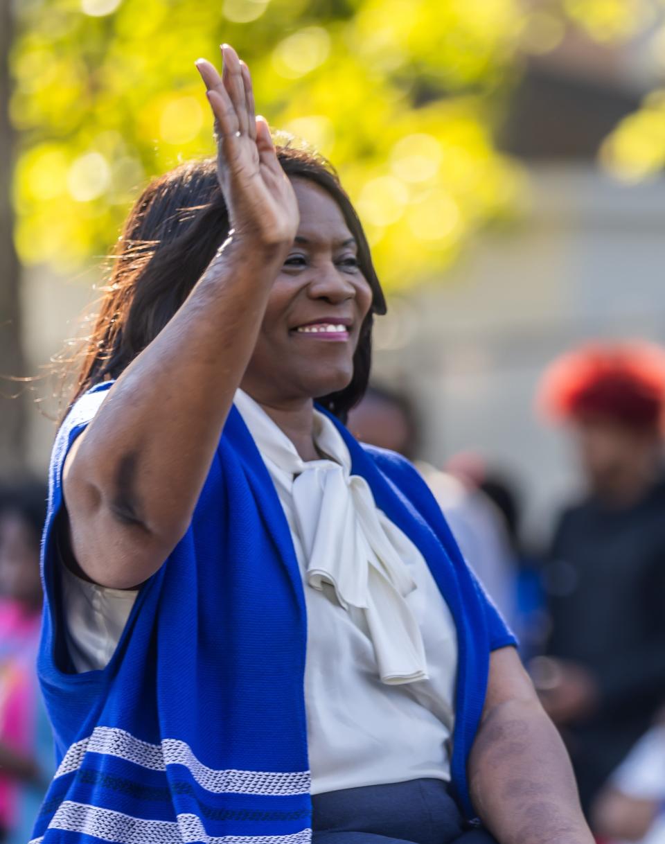 Tennessee State University President Glenda Glover waves to spectators during the TSU Homecoming parade on Oct. 14, 2023.