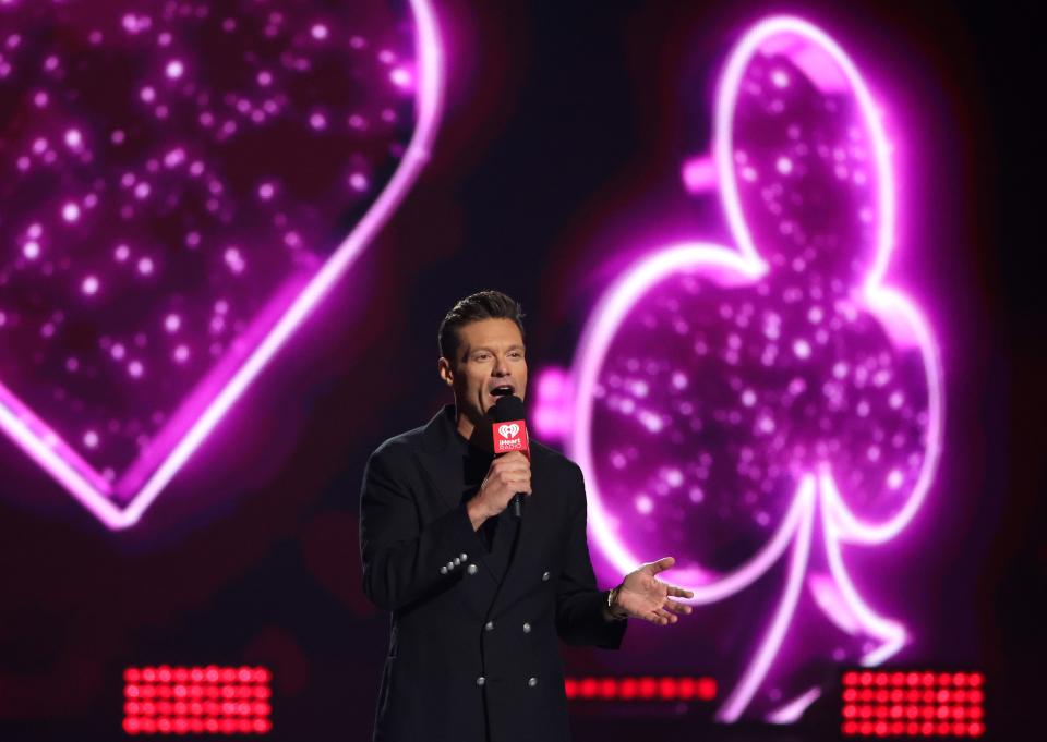 Ryan Seacrest fulfilling host duties onstage during the 2023 iHeartRadio Music Festival at T-Mobile Arena in Las Vegas, Nevada.