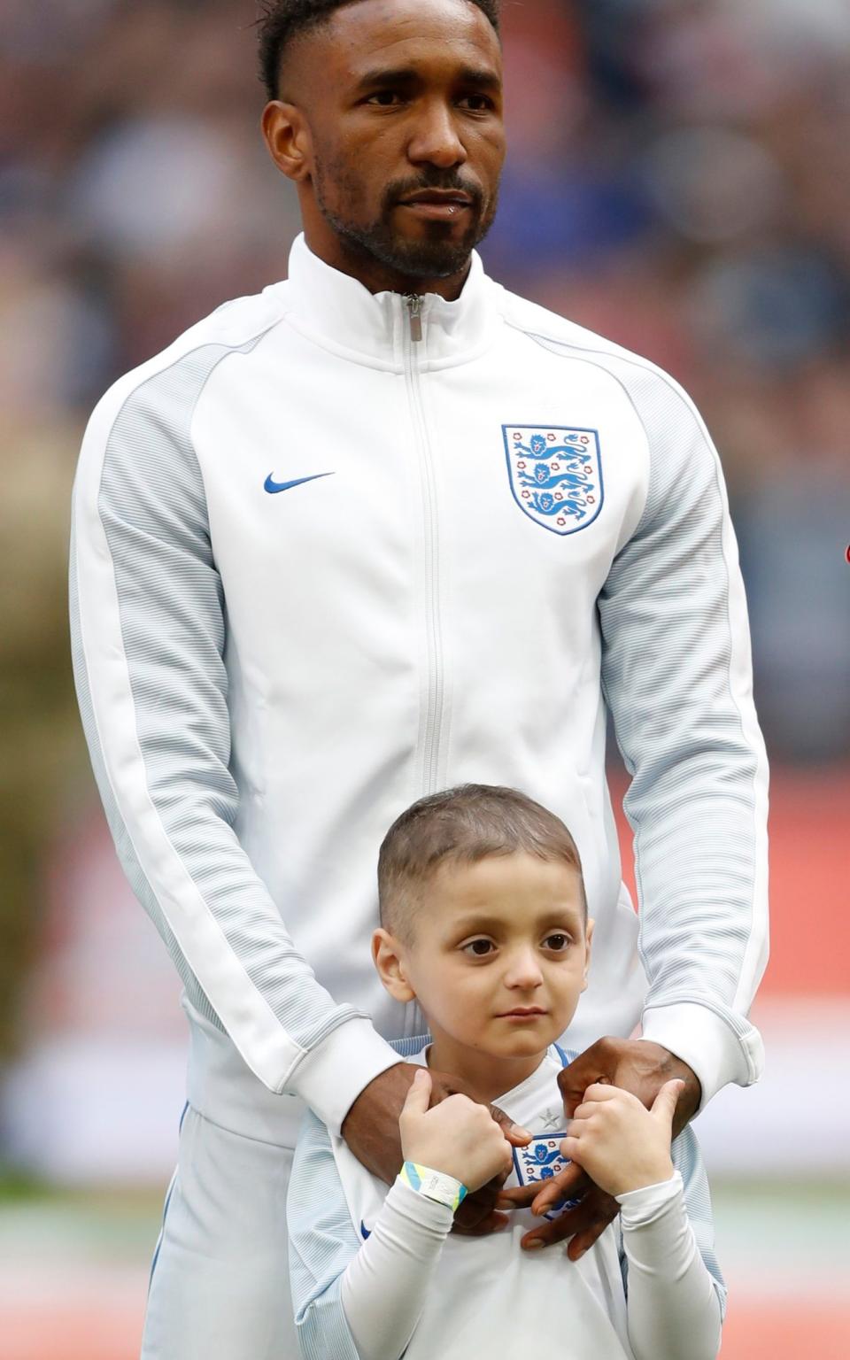 England's Jermain Defoe with mascot Bradley Lowery  - Credit: Reuters