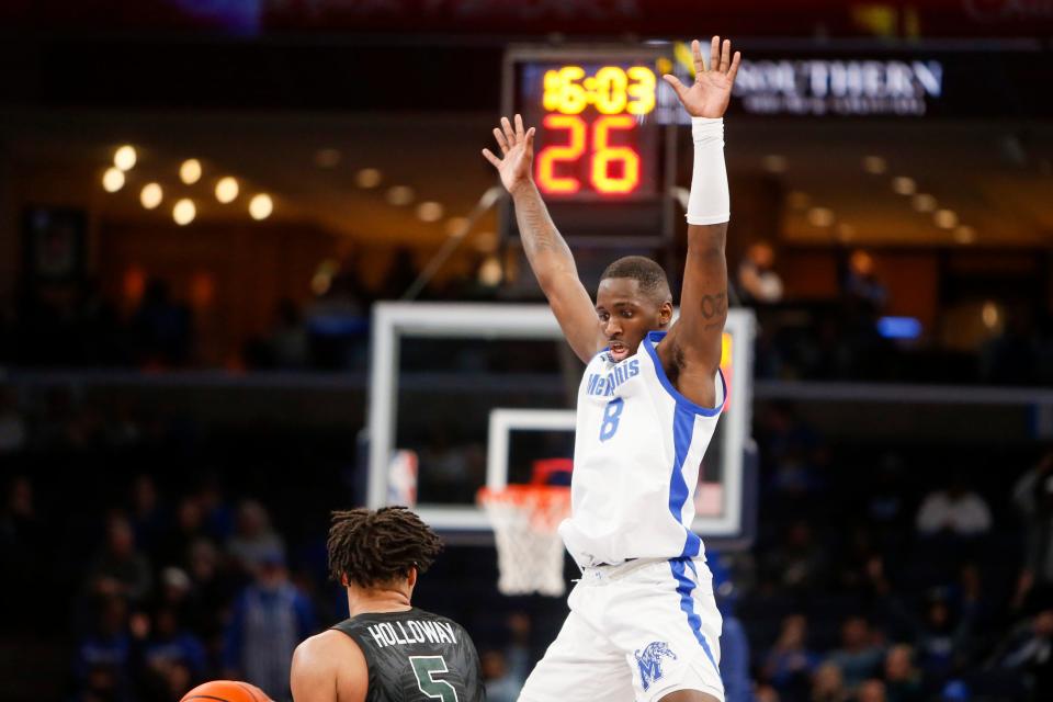 Memphis' David Jones (8) jumps to block Tulane's Collin Holloway (5) during the game between Tulane University and the University of Memphis at FedExForum in Memphis, Tenn., on Sunday, February 11, 2024.