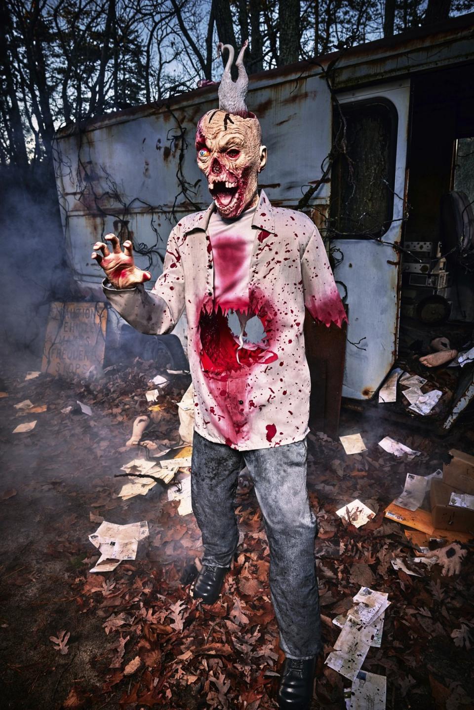 Spirit Halloween's Rick Ratman zombie animatronic figure, posed.