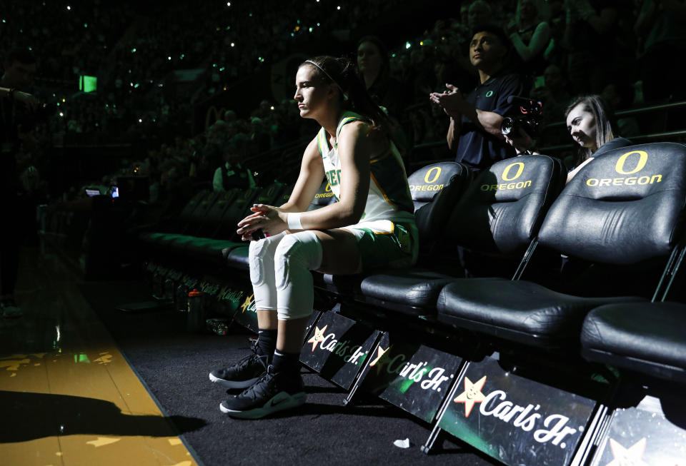 Oregon guard Sabrina Ionescu waits to be introduced before playing Washington in an NCAA college basketball game in Eugene, Ore., Sunday, March 1, 2020. (AP Photo/Thomas Boyd)