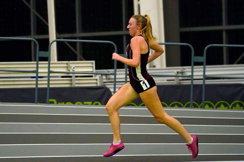 Grace DelGiorno of Morristown places first in the 3200-meter race during the Morris County winter track championships at the Ocean Breeze Athletic Complex in Staten Island on Jan. 30, 2023.