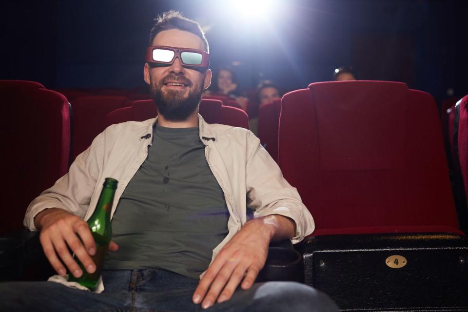 <p>Getty</p> A patron at a movie theater