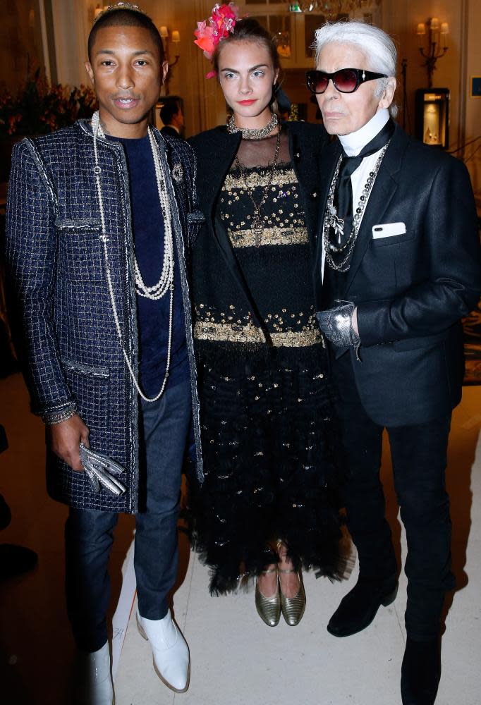 The musician Pharrell Williams, actor and model Cara Delevingne with Lagerfeld in Paris, 2017.