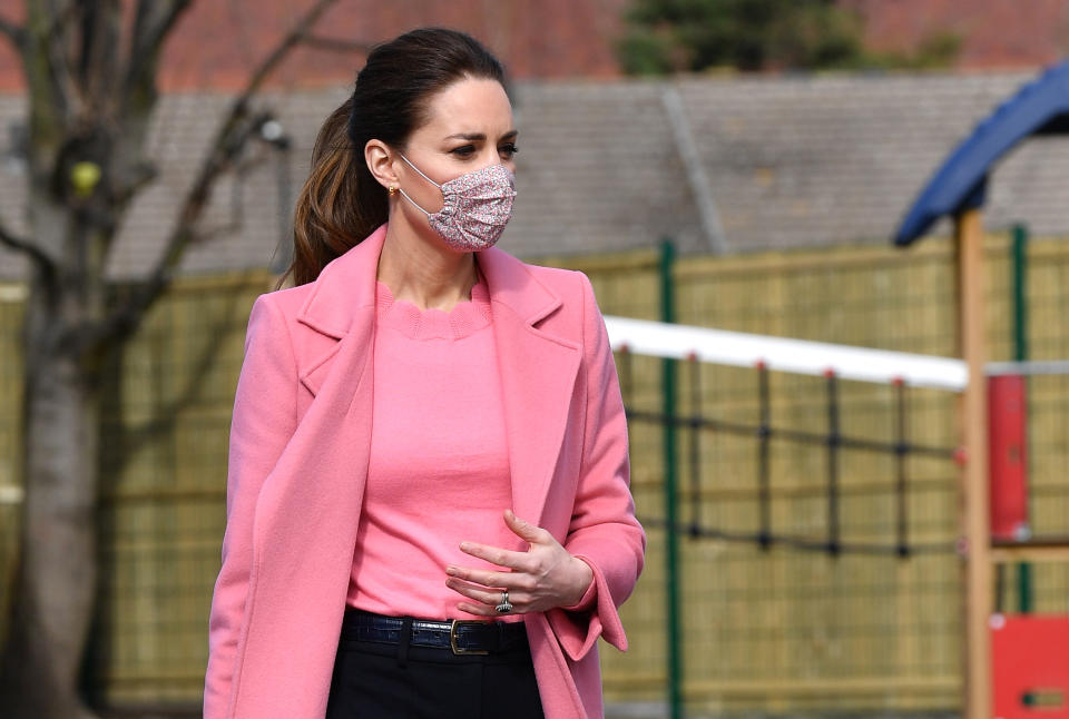 Kate Middleton wears a number of Boden pieces, including this scalloped jumper. (Getty)