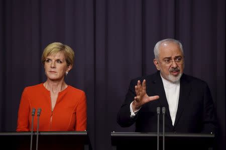 Australian Foreign Minister Julie Bishop (L) and Iranian Foreign Minister Mohammad Javad Zarif speak during a news conference at Australia's Parliament House in Canberra, March 15, 2016. REUTERS/Lukas Coch/AAP