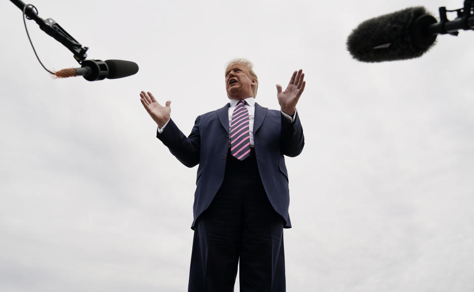 President Donald Trump talks to the media before boarding Air Force One for a trip to Phoenix to visit a Honeywell plant that manufactures protective equipment, Tuesday, May 5, 2020, in Andrews Air Force Base, Md. (Evan Vucci/AP)