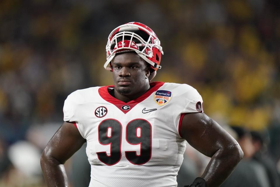 Georgia defensive lineman Jordan Davis watches during warm ups before the Orange Bowl against Michigan.