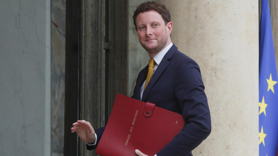 French Transport Minister Clément Beaune, carrying a ministerial portfolio.