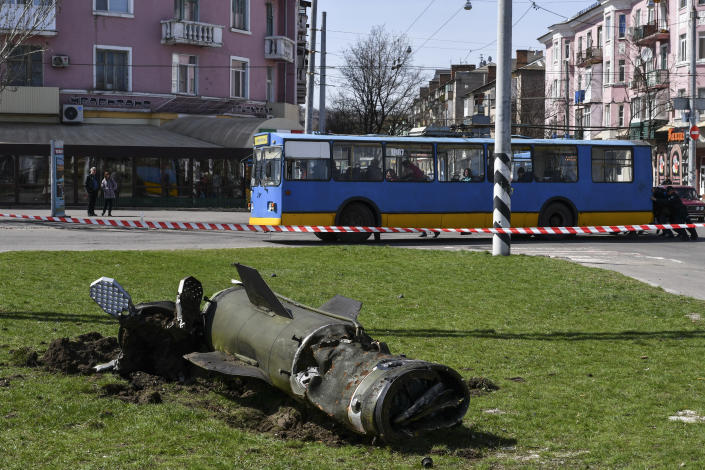 FILE - A fragment of a Tochka-U missile lies on the ground following an attack at the railway station in Kramatorsk, Ukraine, April 8, 2022. An interminable and unwinnable war in Europe? That's what NATO leaders fear and are bracing for as Russia's war in Ukraine grinds into its third month with little sign of a decisive military victory for either side, and no resolution in sight. (AP Photo/Andriy Andriyenko, File)