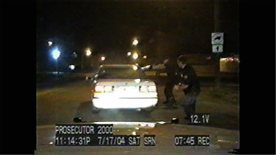 This image from a video released by the U.S. Supreme Court from a dashboard camera video shows West Memphis, Ark., police officers firing shots at a car driven by Donald Rickard on July 17, 2004. Rickard led police across the Mississippi River into Memphis, Tenn., on a high-speed chase. Rickard and passenger Kelly Allen were shot to death by officers. The Supreme Court is considering an appeal from the officers who say they did nothing wrong and should not be held financially liable for the deaths. Supreme Court justices on March 4, 2014, seemed poised to rule for police officers involved in a high-speed chase that ended with the deaths of the fleeing driver and his passenger. The video was not shown in court, but justices had seen it as part of filings with the court. (AP Photo/U.S. Supreme Court)
