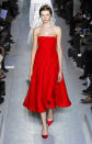 <b>Valentino SS13 </b><br><br>This strapless red dress wouldn't look out of place on the Oscars red carpet.<br><br>© Rex