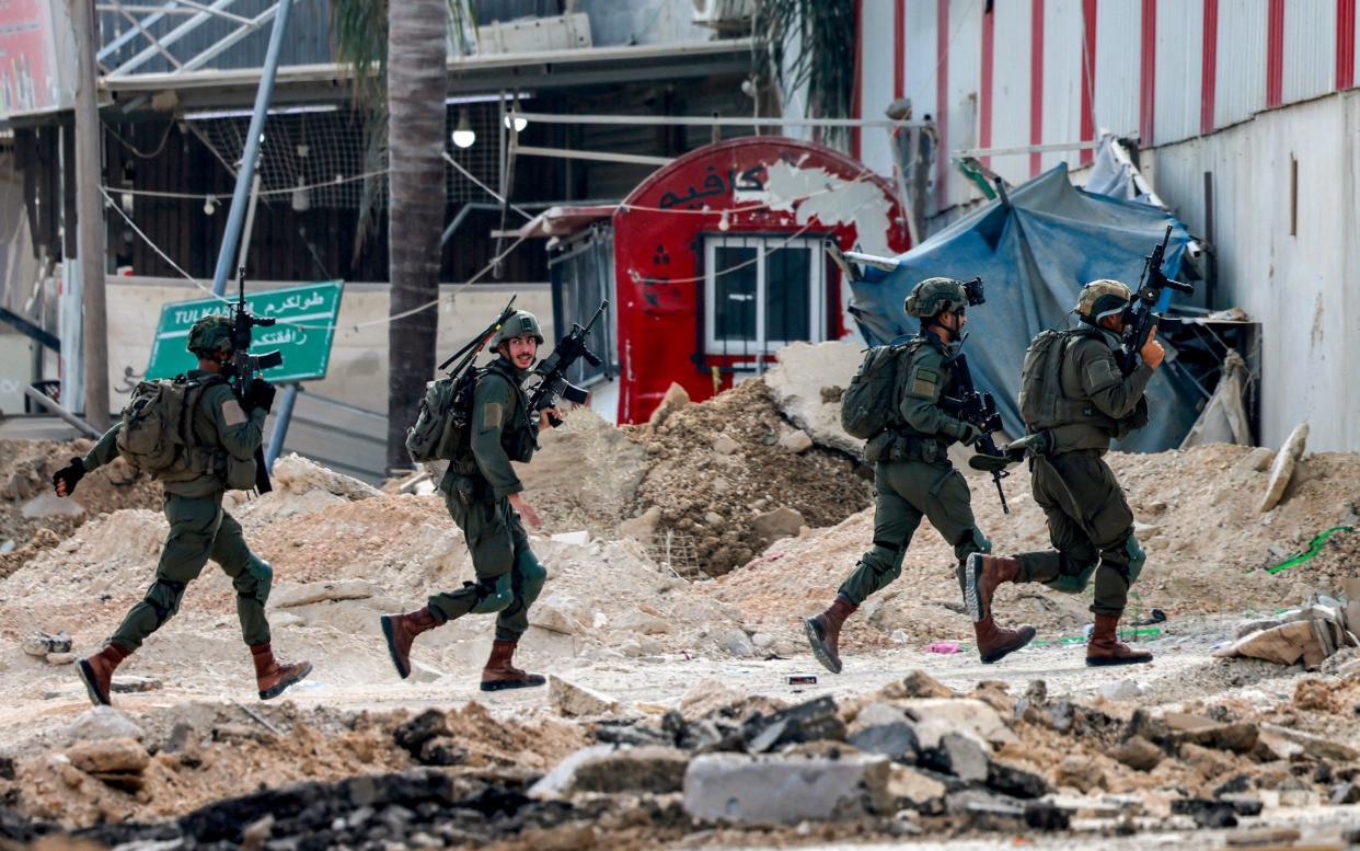 Israeli soldiers during an operation in the West Bank on Thursday