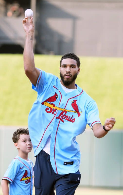 Boston Celtics forward, 4-time NBA All Star Jayson Tatum, throws a ceremonial first pitch before the Minnesota Twins-St. Louis Cardinals baseball game at Busch Stadium in St. Louis in 2023. File Photo by Bill Greenblatt/UPI