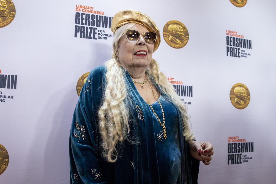 Joni Mitchell arrives at the presentation of the Gershwin Prize, which honors a musician's lifetime contribution to popular music, hosted at DAR Constitution Hall in Washington on Wednesday, March 1, 2023. This year's winner was Joni Mitchell. (AP Photo/Amanda Andrade-Rhoades)