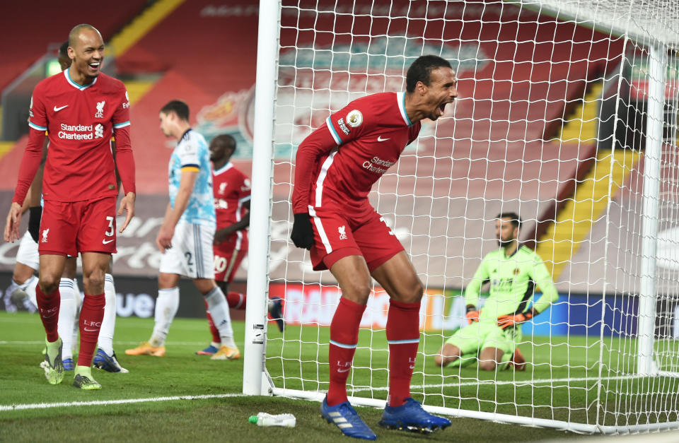 Liverpool's Joel Matip (centre) celebrates scoring their third goal against Wolverhampton Wanderers