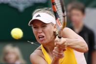 Denmark's Caroline Wozniacki in action against Italy's Karin Knapp at Roland Garros on May 26, 2015