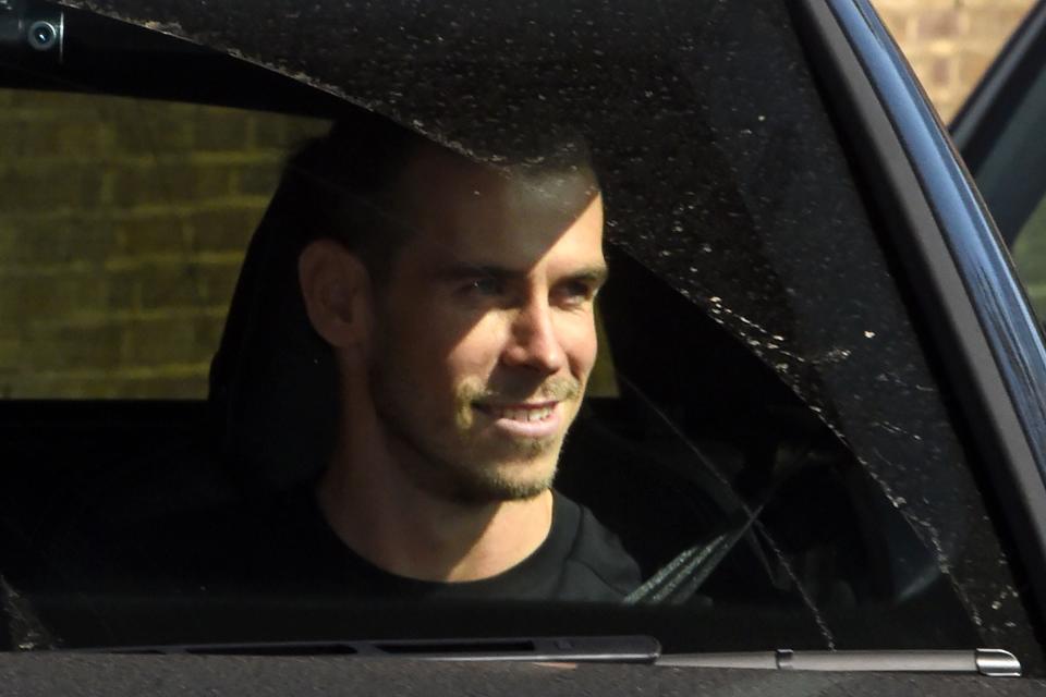 Gareth Bale arrives at Spurs' training ground yesterday (AFP via Getty Images)
