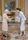 <p> Angelina Jolie wore a pale collared suit to meet the Queen when she received an honorary damehood for her work in UK foreign policies and in the campaign to stop war-zone sexual violence. Can we also get Angie an award for this outfit, though?!</p>