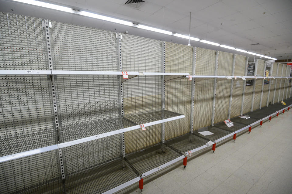 Picture of empty shelves due to panic buying at Coles