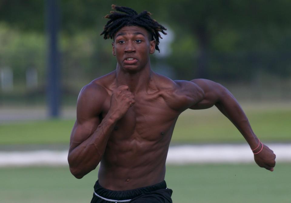 Players from Florida High's football team practice on June 28, 2022, at Florida High.