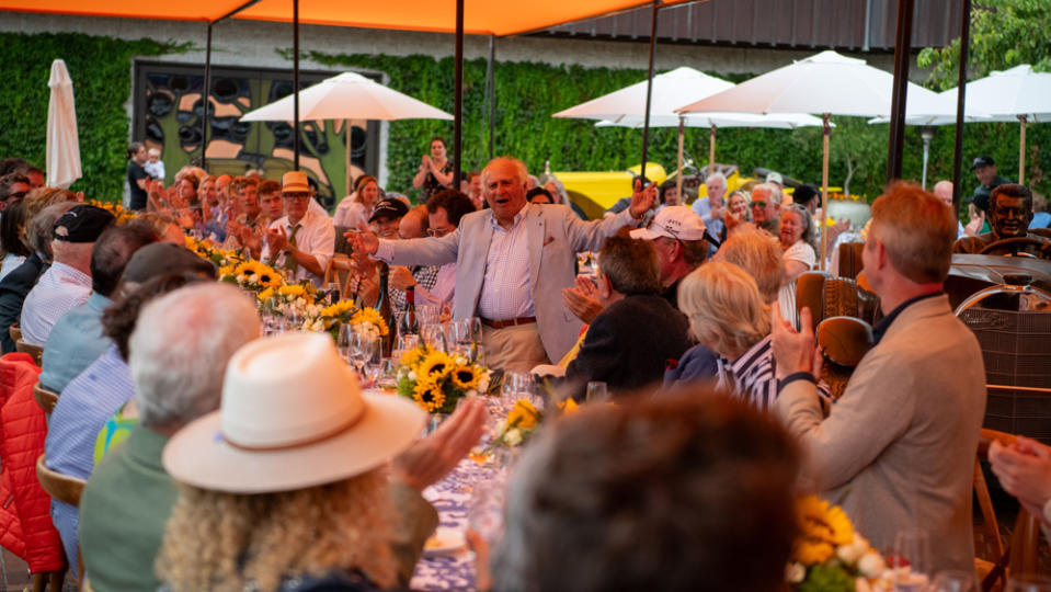 Sir Michael Kadoorie addresses a cadre of car collectors and automotive enthusiasts at a lunch break during a classic Mercedes-Benz road rally in Northern California.