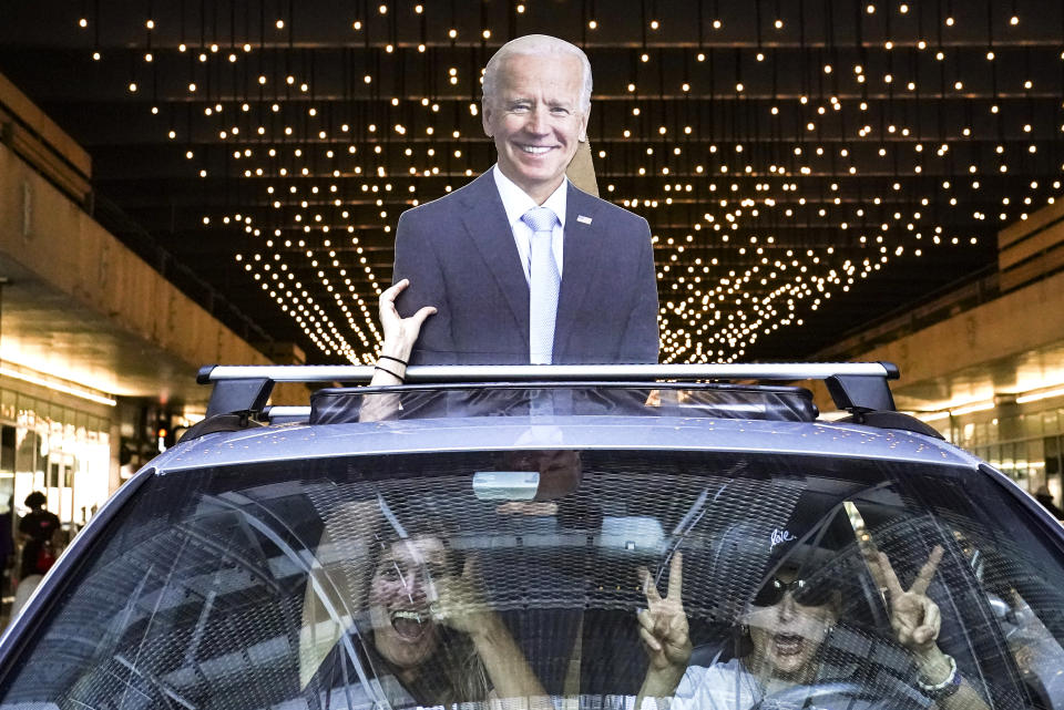 Motorists celebrate after the 2020 presidential election is called for President-elect Joe Biden, Saturday, Nov. 7, 2020, in Philadelphia. (AP Photo/John Minchillo)