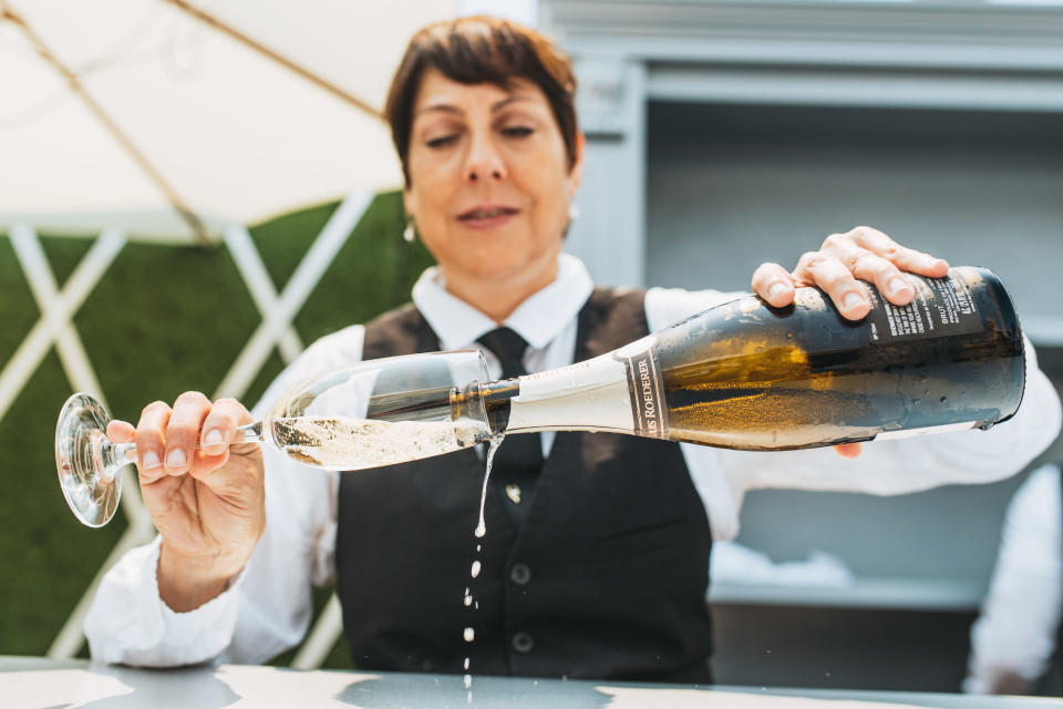 <p>One undoubtedly gets thirsty while walking around the Quail Lodge. Just don't spill your drink on any of the cars. </p>