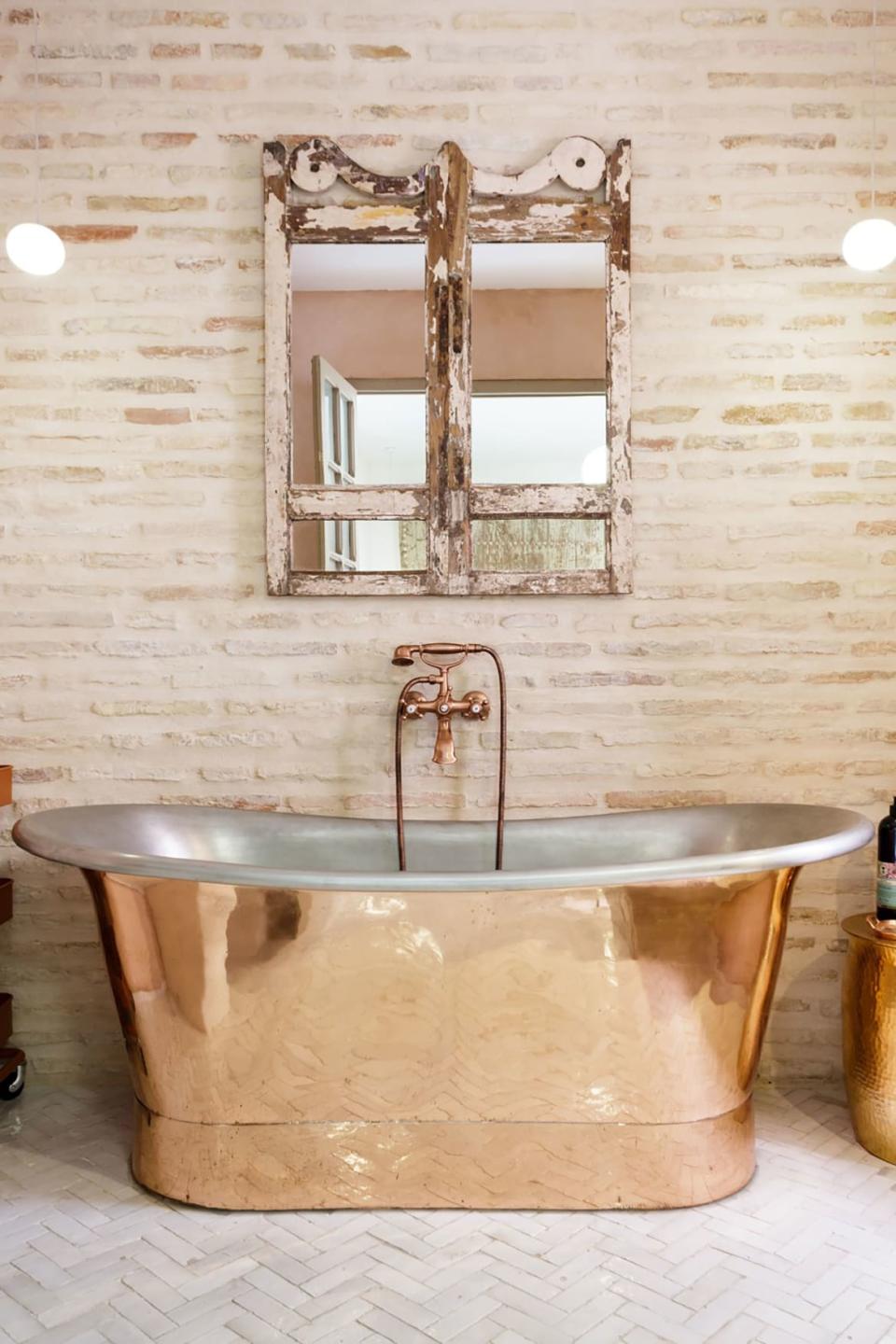 <div class="inline-image__caption"><p>Nothing says old-world cool like a freestanding copper tub. Grab a copy of <i>Don Quixote,</i> settle into the suds, and get ready to ride out on a hometown adventure all from the comfort of your bath.</p><p><a href="https://urldefense.proofpoint.com/v2/url?u=https-3A__www.airbnb.com_rooms_plus_19841846-3Fguests-3D1-26adults-3D1-26source-5Fimpression-5Fid-3Dp3-5F1556911830-5F8kTZ9MQvWA2GtqYt&d=DwMFaQ&c=r30hyXAdWe8oret4PlAIyA&r=jtBxEpU3TgpSdJ3yg0L0isIrcR6Y1a8FSqjFnjAPzXpbB4tuwOLn1g8Q7sHGEnyW&m=Hmav48W1H1fcfj4b6aNU1UZbS-mFyTcKvVBcBXXDqqs&s=4f8VPrdDDBbI0zcYOvbAe5SrWDT0PBCJxiLtaihDHvk&e=" rel="nofollow noopener" target="_blank" data-ylk="slk:Rent on Airbnb;elm:context_link;itc:0;sec:content-canvas" class="link "><i>Rent on Airbnb</i></a></p></div> <div class="inline-image__credit">AirBnB</div>